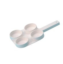 En vit testplatta med plats fr fyra tester