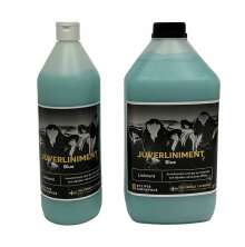 Tv flaskor  Juverliniment Blue, 1 liter och 2,7 liter, med svart etikett som visar kor i bakgrunden. Produkterna innehller bltt liniment i gelform.